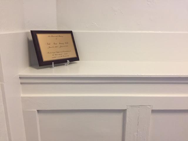 Plaque on shelf